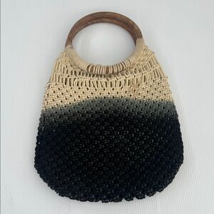 Elegant Black and Cream Woven Handbag